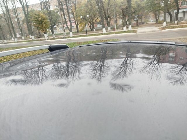 Черный Шевроле Лачетти, объемом двигателя 1.8 л и пробегом 300 тыс. км за 3800 $, фото 7 на Automoto.ua