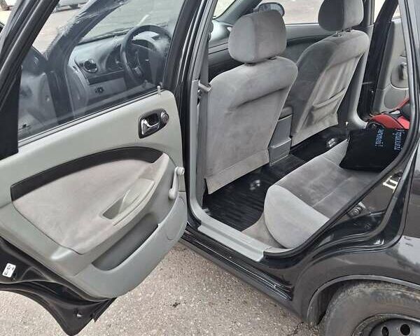 Черный Шевроле Лачетти, объемом двигателя 1.8 л и пробегом 335 тыс. км за 4000 $, фото 26 на Automoto.ua