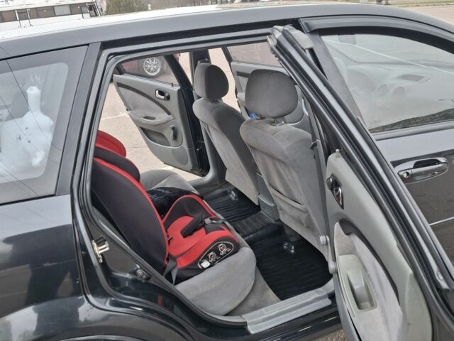 Черный Шевроле Лачетти, объемом двигателя 1.8 л и пробегом 335 тыс. км за 4000 $, фото 13 на Automoto.ua