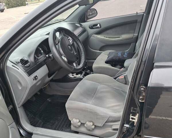 Черный Шевроле Лачетти, объемом двигателя 1.8 л и пробегом 335 тыс. км за 4000 $, фото 20 на Automoto.ua