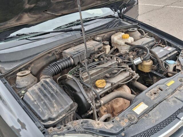 Черный Шевроле Лачетти, объемом двигателя 1.8 л и пробегом 335 тыс. км за 4000 $, фото 18 на Automoto.ua