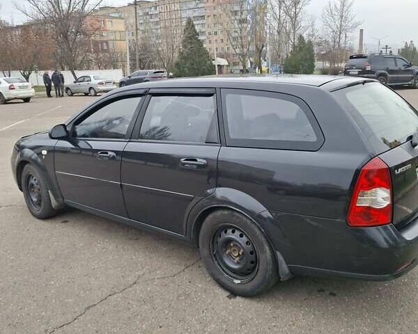 Черный Шевроле Лачетти, объемом двигателя 1.8 л и пробегом 335 тыс. км за 4000 $, фото 6 на Automoto.ua