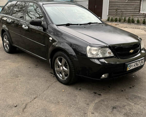 Черный Шевроле Лачетти, объемом двигателя 1.8 л и пробегом 175 тыс. км за 4500 $, фото 4 на Automoto.ua