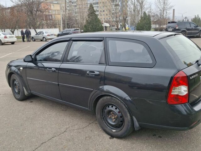 Черный Шевроле Лачетти, объемом двигателя 1.8 л и пробегом 335 тыс. км за 4000 $, фото 4 на Automoto.ua