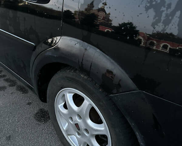 Черный Шевроле Лачетти, объемом двигателя 1.8 л и пробегом 180 тыс. км за 3900 $, фото 14 на Automoto.ua