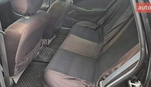 Черный Шевроле Лачетти, объемом двигателя 1.8 л и пробегом 280 тыс. км за 3899 $, фото 6 на Automoto.ua