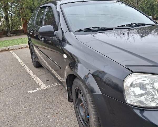 Черный Шевроле Лачетти, объемом двигателя 1.8 л и пробегом 335 тыс. км за 4000 $, фото 11 на Automoto.ua