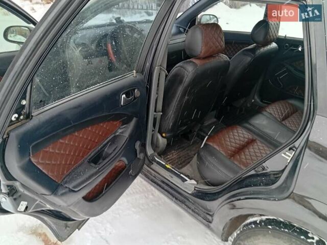 Черный Шевроле Лачетти, объемом двигателя 1.8 л и пробегом 255 тыс. км за 3800 $, фото 5 на Automoto.ua