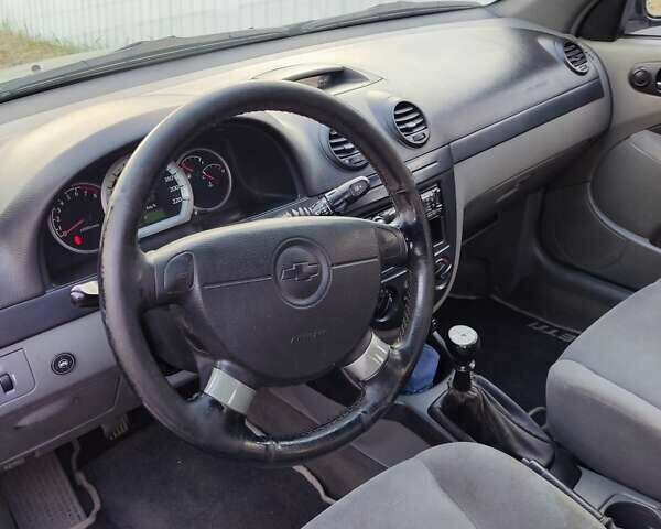 Черный Шевроле Лачетти, объемом двигателя 1.8 л и пробегом 312 тыс. км за 3100 $, фото 7 на Automoto.ua