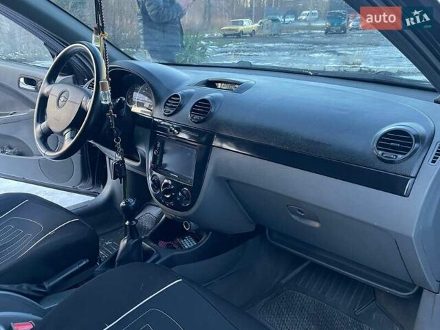 Черный Шевроле Лачетти, объемом двигателя 1.8 л и пробегом 240 тыс. км за 4050 $, фото 33 на Automoto.ua
