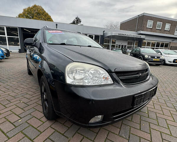 Черный Шевроле Лачетти, объемом двигателя 1.6 л и пробегом 228 тыс. км за 4150 $, фото 7 на Automoto.ua