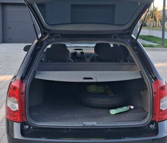 Черный Шевроле Лачетти, объемом двигателя 1.8 л и пробегом 112 тыс. км за 6500 $, фото 6 на Automoto.ua