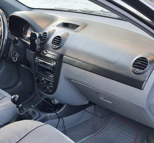 Черный Шевроле Лачетти, объемом двигателя 1.8 л и пробегом 112 тыс. км за 6500 $, фото 15 на Automoto.ua