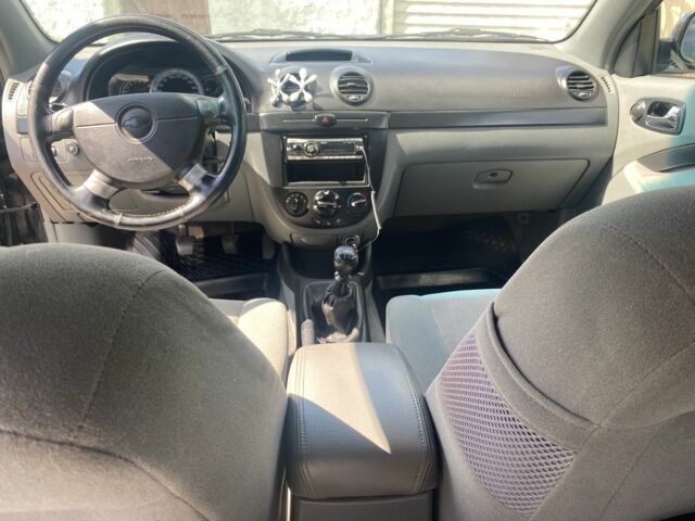 Черный Шевроле Лачетти, объемом двигателя 1.8 л и пробегом 266 тыс. км за 4499 $, фото 7 на Automoto.ua