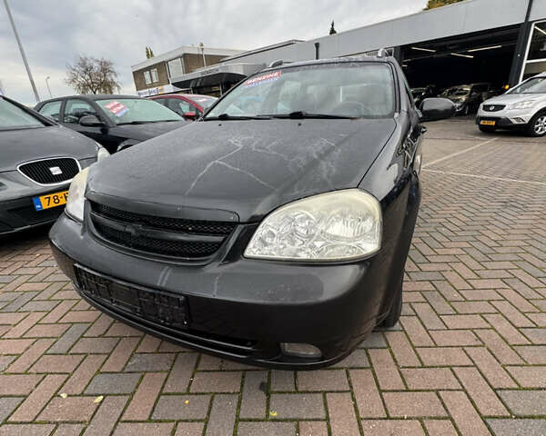 Черный Шевроле Лачетти, объемом двигателя 1.6 л и пробегом 228 тыс. км за 4150 $, фото 2 на Automoto.ua