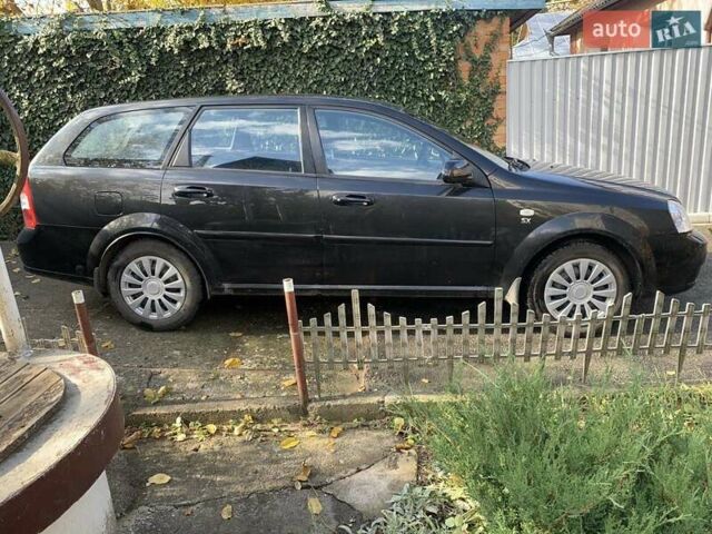 Чорний Шевроле Лачетті, об'ємом двигуна 1.8 л та пробігом 142 тис. км за 4500 $, фото 7 на Automoto.ua