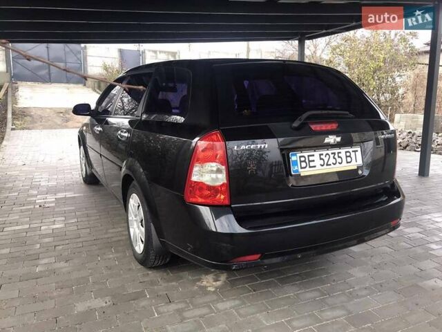 Черный Шевроле Лачетти, объемом двигателя 1.8 л и пробегом 348 тыс. км за 4400 $, фото 5 на Automoto.ua