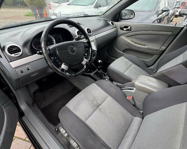 Черный Шевроле Лачетти, объемом двигателя 1.6 л и пробегом 228 тыс. км за 4150 $, фото 6 на Automoto.ua