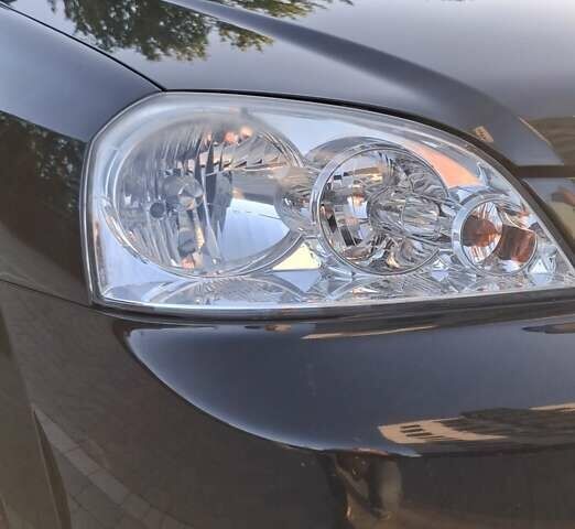 Черный Шевроле Лачетти, объемом двигателя 1.8 л и пробегом 112 тыс. км за 6500 $, фото 26 на Automoto.ua