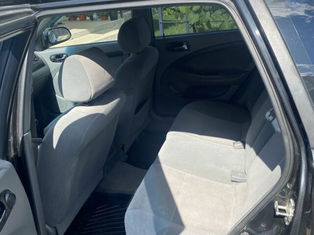 Черный Шевроле Лачетти, объемом двигателя 1.8 л и пробегом 266 тыс. км за 4499 $, фото 8 на Automoto.ua