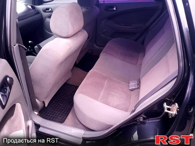 Чорний Шевроле Лачетті, об'ємом двигуна 1.8 л та пробігом 240 тис. км за 4350 $, фото 11 на Automoto.ua