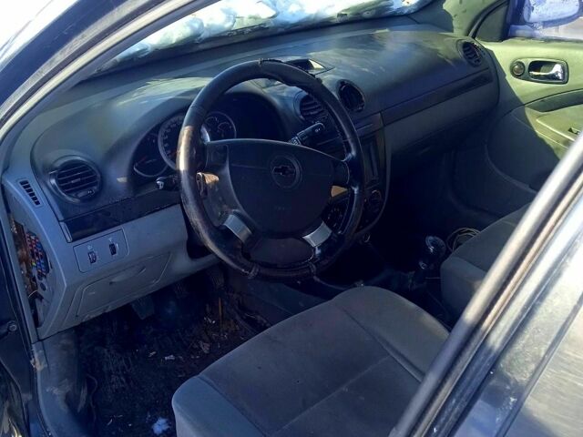 Черный Шевроле Лачетти, объемом двигателя 1.8 л и пробегом 20000 тыс. км за 1100 $, фото 7 на Automoto.ua