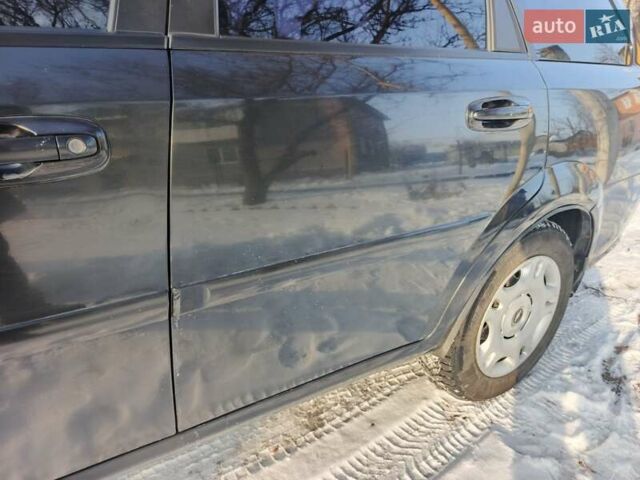 Чорний Шевроле Лачетті, об'ємом двигуна 1.8 л та пробігом 217 тис. км за 3950 $, фото 12 на Automoto.ua
