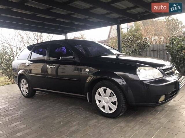 Черный Шевроле Лачетти, объемом двигателя 1.8 л и пробегом 348 тыс. км за 4400 $, фото 1 на Automoto.ua