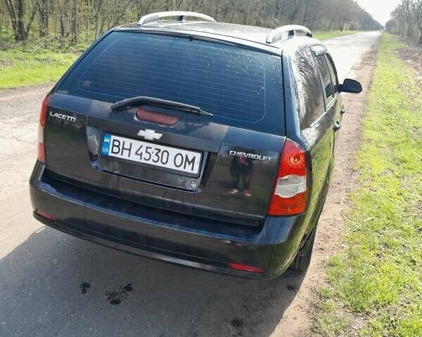 Черный Шевроле Лачетти, объемом двигателя 1.8 л и пробегом 260 тыс. км за 4900 $, фото 3 на Automoto.ua