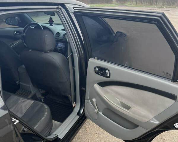 Чорний Шевроле Лачетті, об'ємом двигуна 1.8 л та пробігом 387 тис. км за 4700 $, фото 11 на Automoto.ua