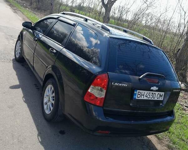 Черный Шевроле Лачетти, объемом двигателя 1.8 л и пробегом 260 тыс. км за 4900 $, фото 6 на Automoto.ua