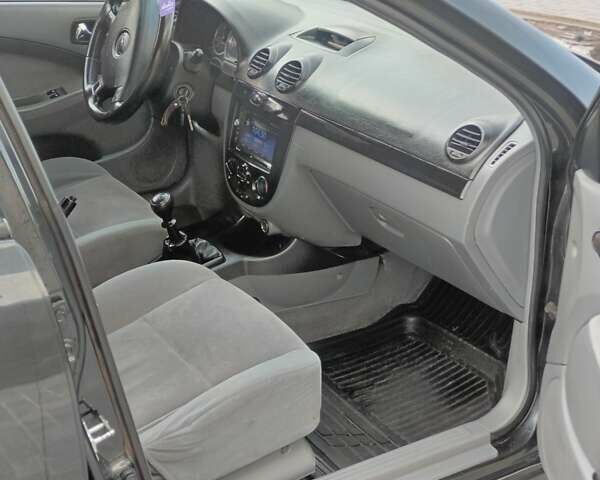 Чорний Шевроле Лачетті, об'ємом двигуна 1.8 л та пробігом 206 тис. км за 4100 $, фото 7 на Automoto.ua