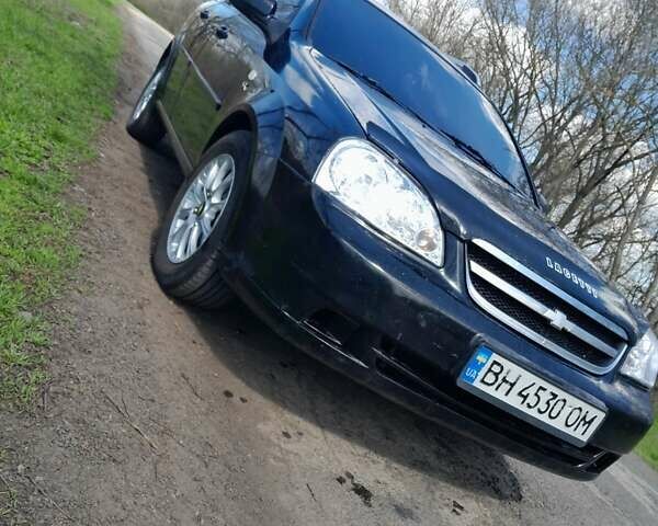 Черный Шевроле Лачетти, объемом двигателя 1.8 л и пробегом 260 тыс. км за 4900 $, фото 4 на Automoto.ua