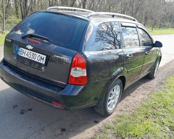 Черный Шевроле Лачетти, объемом двигателя 1.8 л и пробегом 260 тыс. км за 4900 $, фото 5 на Automoto.ua