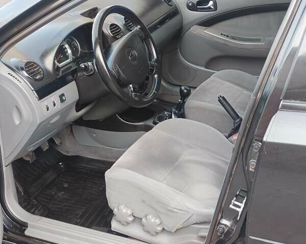 Чорний Шевроле Лачетті, об'ємом двигуна 1.8 л та пробігом 206 тис. км за 4100 $, фото 12 на Automoto.ua