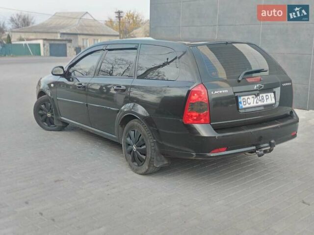 Чорний Шевроле Лачетті, об'ємом двигуна 1.8 л та пробігом 206 тис. км за 4100 $, фото 9 на Automoto.ua