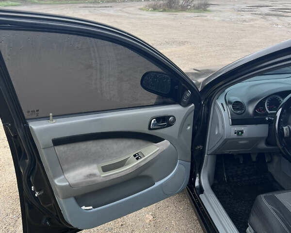 Чорний Шевроле Лачетті, об'ємом двигуна 1.8 л та пробігом 387 тис. км за 4700 $, фото 8 на Automoto.ua