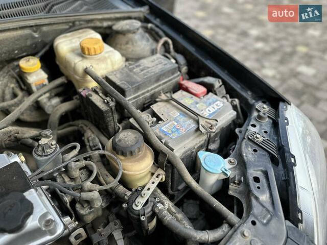 Черный Шевроле Лачетти, объемом двигателя 1.6 л и пробегом 230 тыс. км за 4950 $, фото 120 на Automoto.ua