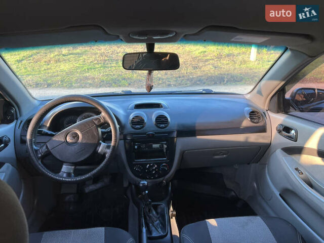 Черный Шевроле Лачетти, объемом двигателя 1.8 л и пробегом 210 тыс. км за 6150 $, фото 7 на Automoto.ua