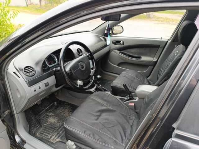 Чорний Шевроле Лачетті, об'ємом двигуна 1.8 л та пробігом 197 тис. км за 5000 $, фото 7 на Automoto.ua