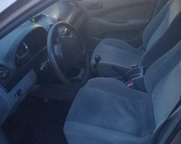 Коричневый Шевроле Лачетти, объемом двигателя 1.4 л и пробегом 225 тыс. км за 2999 $, фото 5 на Automoto.ua