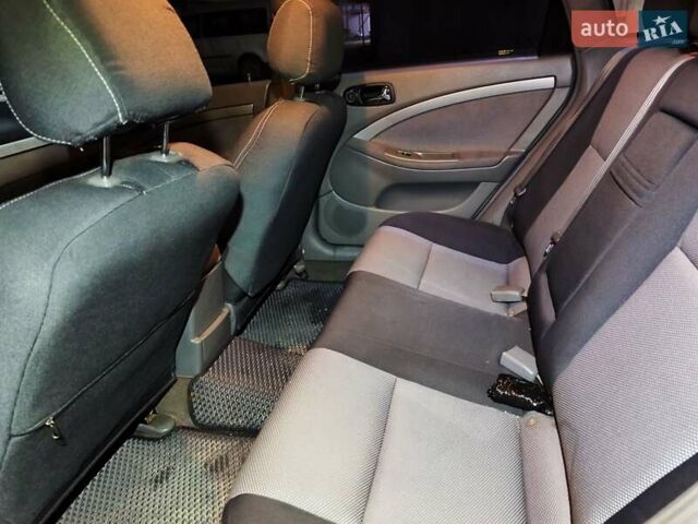 Коричневый Шевроле Лачетти, объемом двигателя 2 л и пробегом 195 тыс. км за 5000 $, фото 11 на Automoto.ua