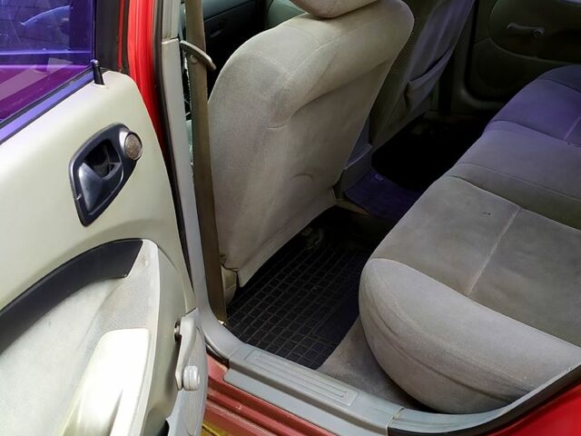 Красный Шевроле Лачетти, объемом двигателя 16 л и пробегом 250 тыс. км за 2300 $, фото 9 на Automoto.ua