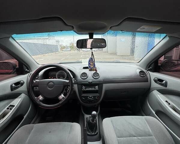 Красный Шевроле Лачетти, объемом двигателя 1.4 л и пробегом 160 тыс. км за 4450 $, фото 8 на Automoto.ua