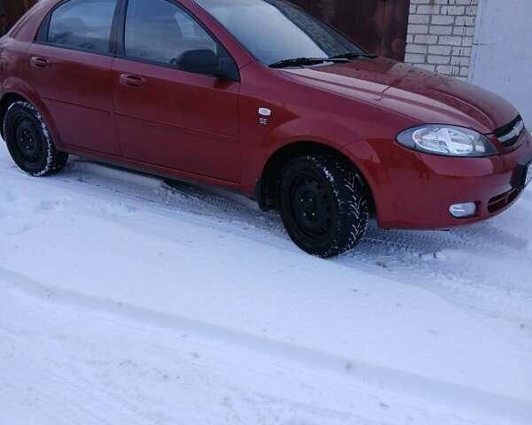 Красный Шевроле Лачетти, объемом двигателя 1.6 л и пробегом 53 тыс. км за 6000 $, фото 1 на Automoto.ua