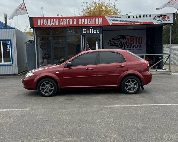 Красный Шевроле Лачетти, объемом двигателя 1.4 л и пробегом 160 тыс. км за 4450 $, фото 7 на Automoto.ua