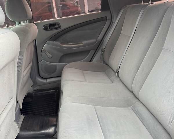 Красный Шевроле Лачетти, объемом двигателя 1.4 л и пробегом 160 тыс. км за 4450 $, фото 9 на Automoto.ua