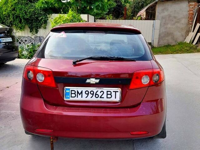 Красный Шевроле Лачетти, объемом двигателя 1.6 л и пробегом 236 тыс. км за 2900 $, фото 6 на Automoto.ua