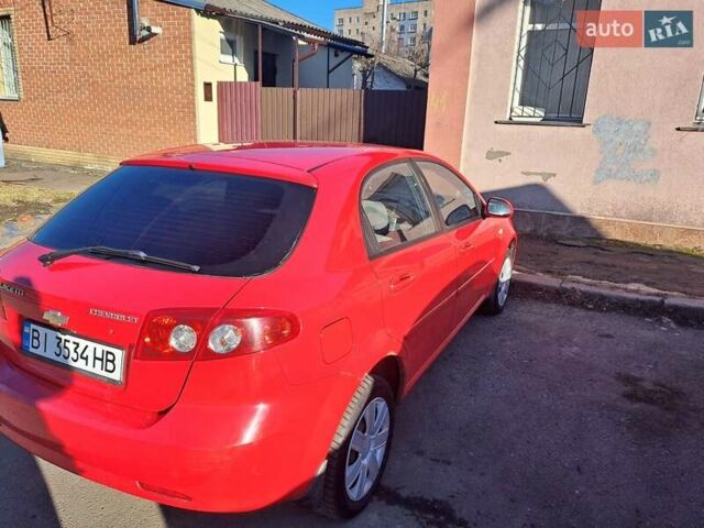 Красный Шевроле Лачетти, объемом двигателя 1.6 л и пробегом 166 тыс. км за 3800 $, фото 3 на Automoto.ua