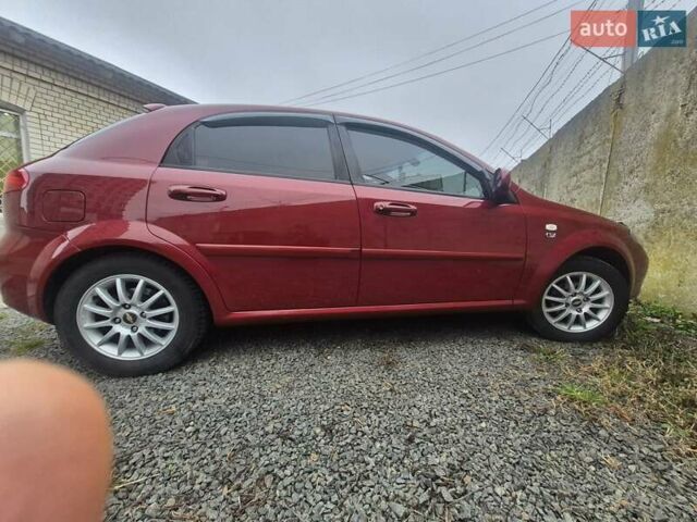Червоний Шевроле Лачетті, об'ємом двигуна 1.8 л та пробігом 187 тис. км за 4500 $, фото 11 на Automoto.ua